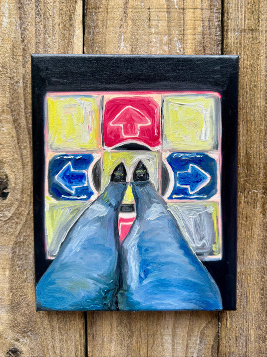 POV of a girl standing on a dance dance revolution mat from the early 2000's