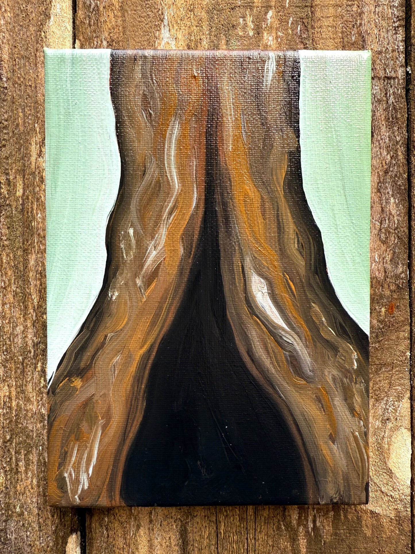 Painting of a tree trunk on a canvas