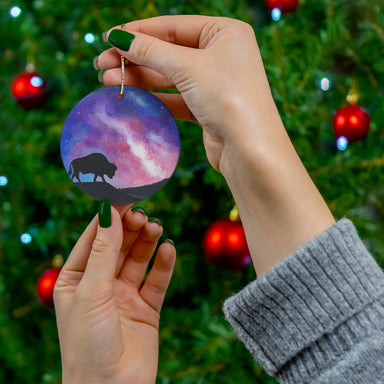 bison ornament with a galaxy background to hang on a christmas tree